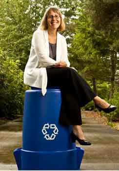 Lisa on blue recycling can